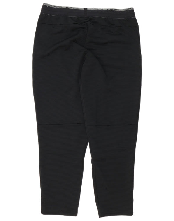 Męskie spodnie dresowe Nike Dri Fit Graphic, duże, czarne prążki