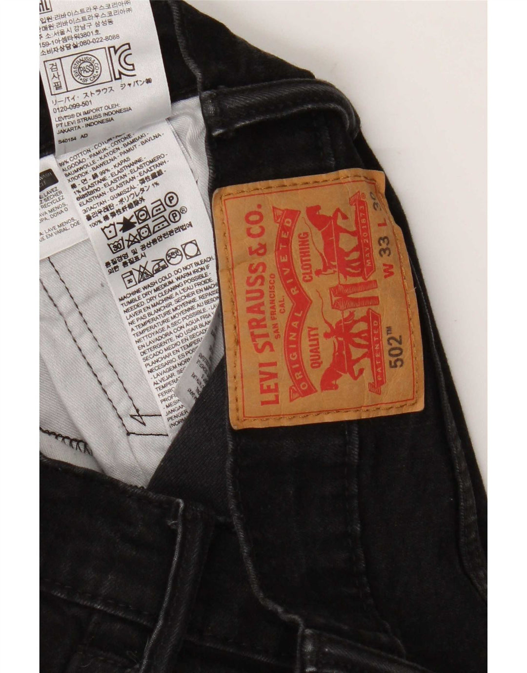 Męskie dżinsy Levi's 502 Straight W33 L27 Czarna bawełna