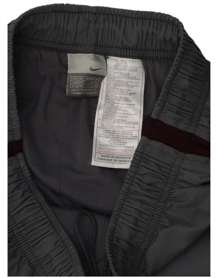 Męskie spodnie wiatrówkowe Nike UK 45/46 XL Szary poliester z blokami kolorów