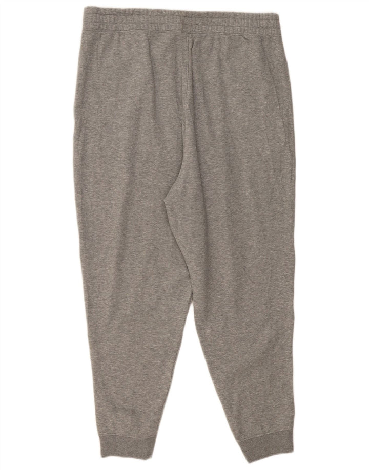 Damskie spodnie dresowe Puma Graphic Joggers XL Szary poliester