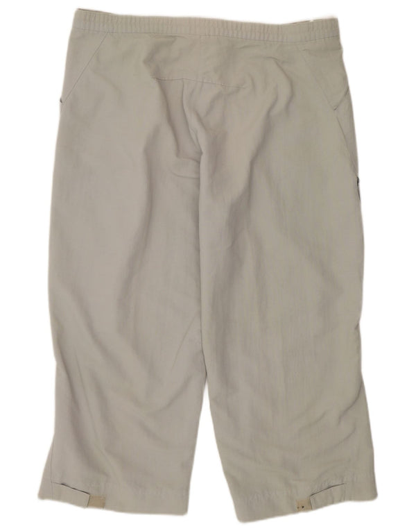 Damskie spodnie dresowe ADIDAS Capri UK 14, średnio zielone, sportowe z poliamidu