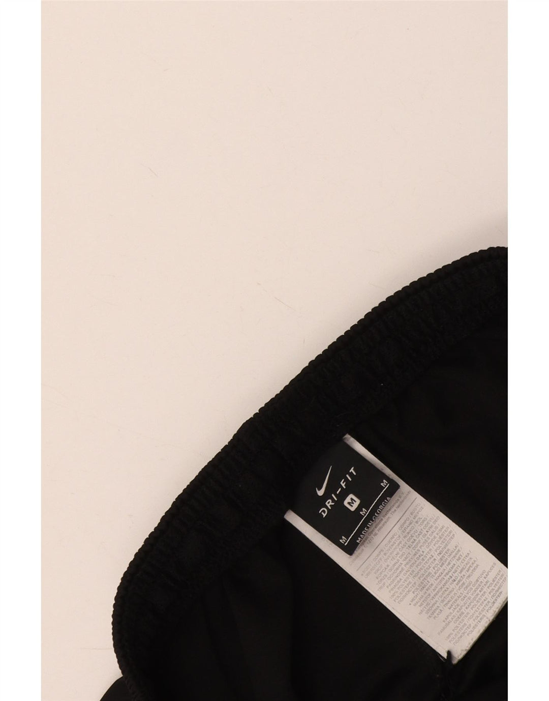 Męskie spodnie dresowe Nike Dri Fit, poliester w kolorze średniej czarnej kolorystyki