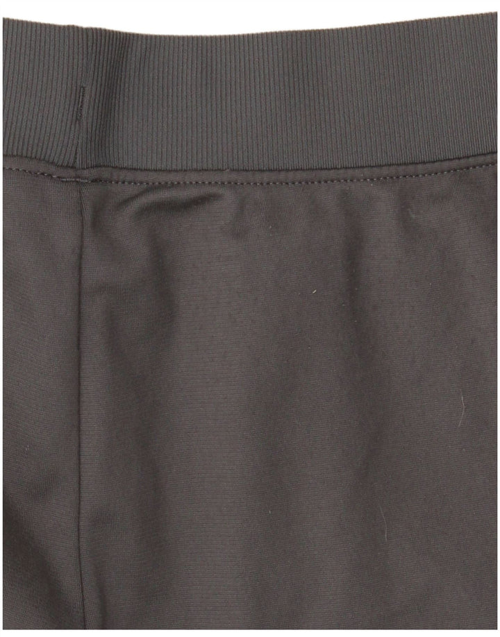 Chłopięce spodnie dresowe Under Armour Joggers 9-10 lat, średnioszare