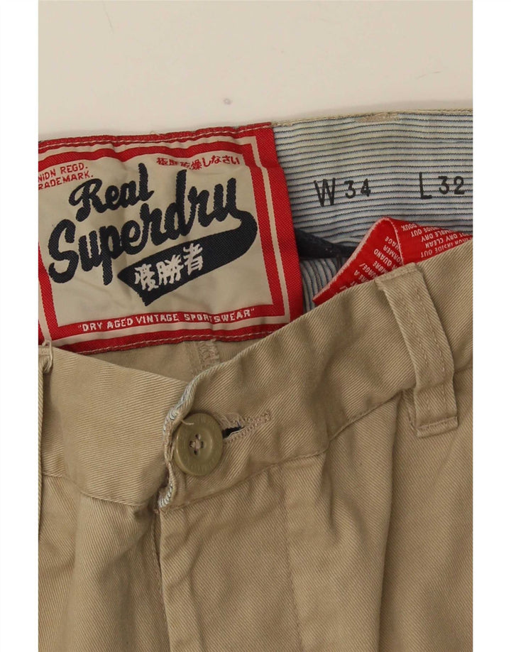 Męskie proste spodnie chino Superdry W34 L32 beżowe