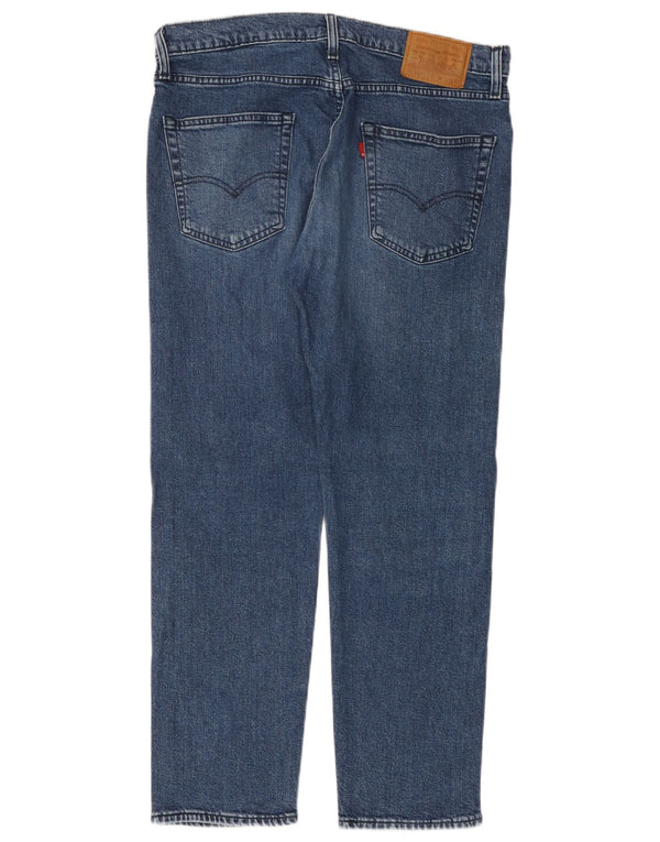 Męskie jeansy LEVI'S 502 zwężane W34 L30, niebieska bawełna