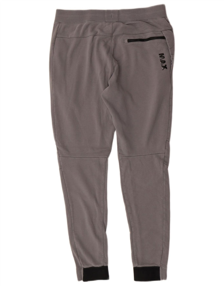 Męskie spodnie dresowe Nike Graphic Dresy Joggery w kolorze średnioszarym