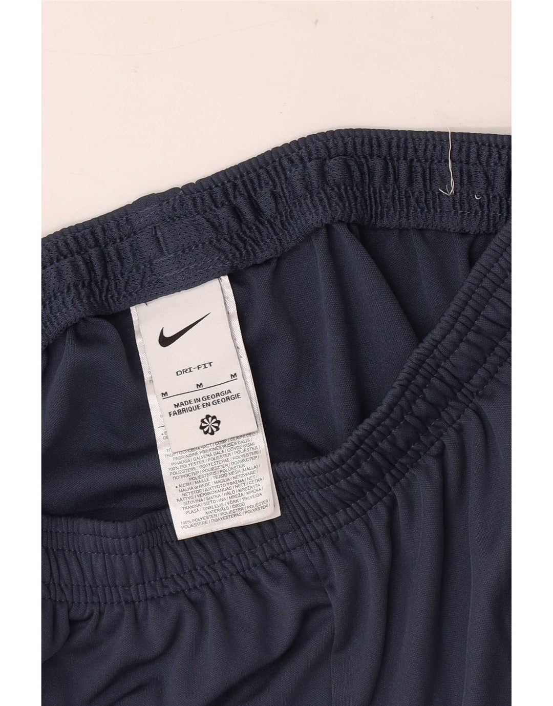 Męskie spodnie dresowe Nike, średnie, granatowe, z blokami kolorów, poliestrowe, sportowe