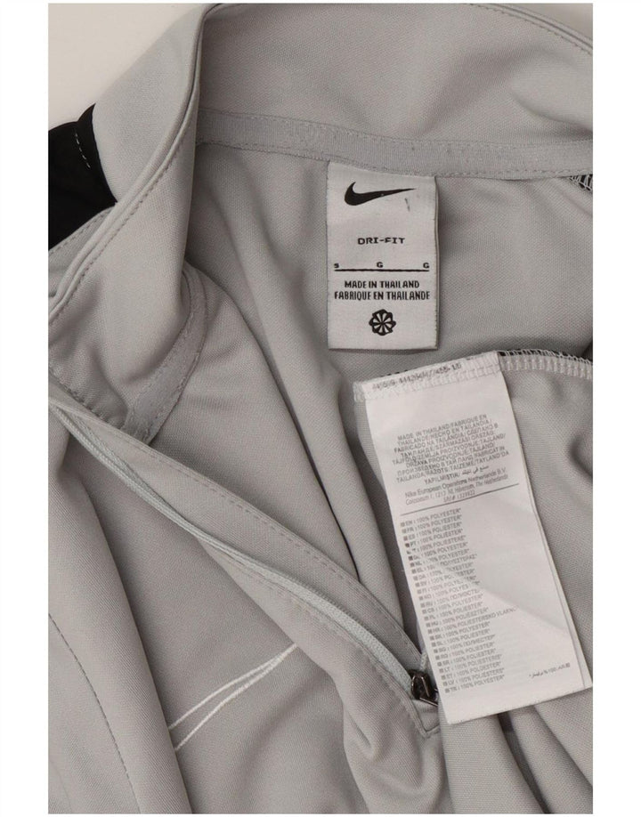 Męski dres Nike Dri Fit z zamkiem błyskawicznym na szyi i małym szarym blokiem kolorów