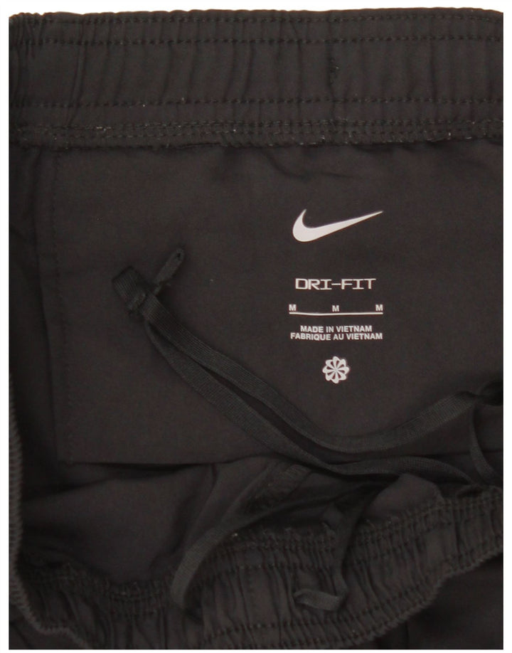 Męskie spodnie dresowe Nike Dri Fit Graphic, średnio czarne, geometryczne