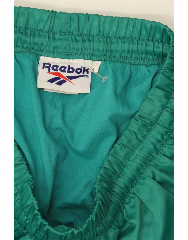 Męskie spodenki sportowe Reebok Średni zielony nylon
