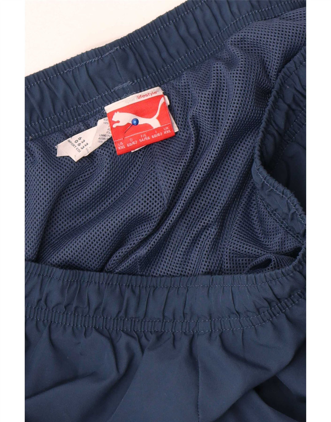 Męskie spodnie dresowe Puma Graphic Capri 2XL Granatowy poliester