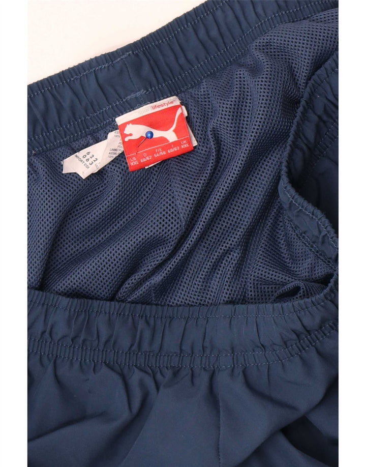 Męskie spodnie dresowe Puma Graphic Capri 2XL Granatowy poliester