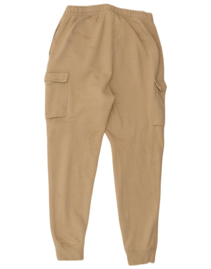 Męskie spodnie dresowe Nike Cargo Joggers w kolorze średniego beżu, bawełny