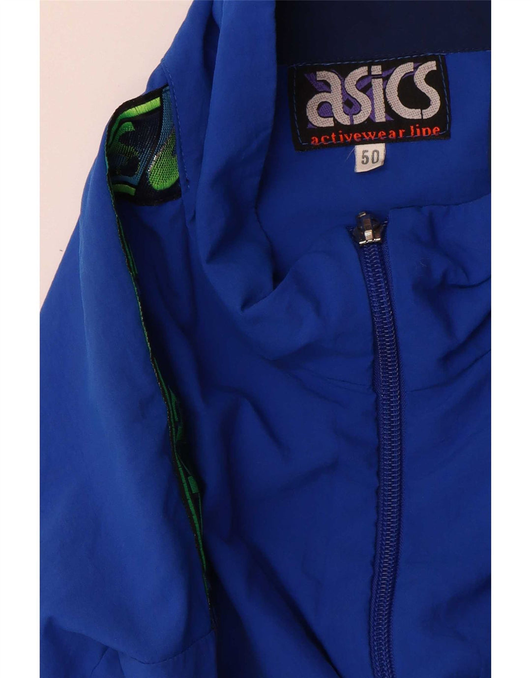 Męska kurtka dresowa Asics Graphic IT 50 w kolorze średnioniebieskim