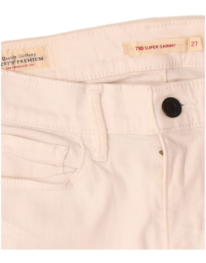 Damskie jeansy Levi's 710 Super Skinny W27 L29 Białe