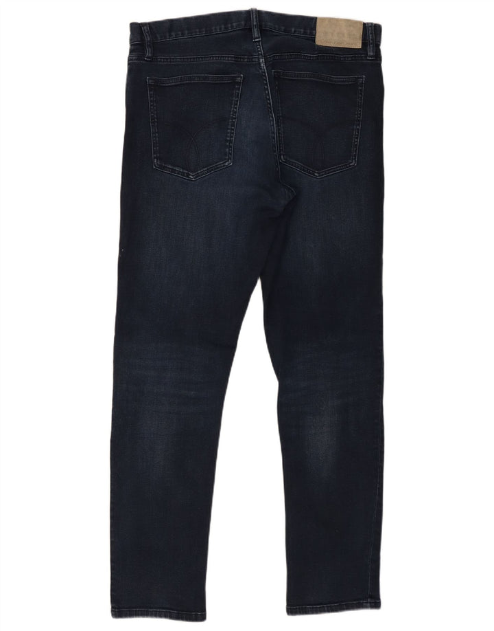 Męskie jeansy Calvin Klein W34 L32 granatowe