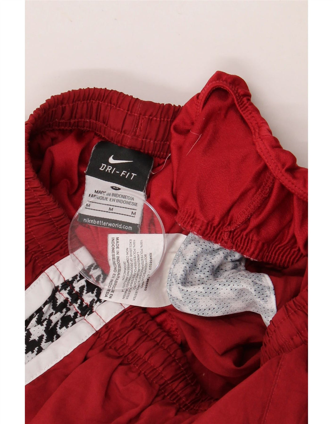 Damskie spodenki sportowe NIKE Dri Fit Graphic UK 12 Średni bordowy pepitka