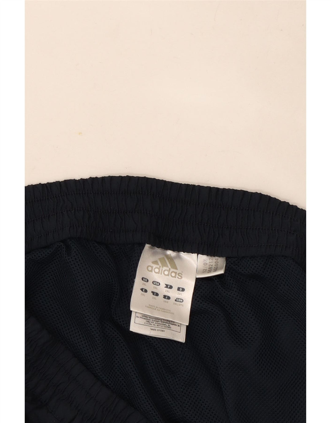 Męskie spodnie dresowe Adidas 2XL granatowe, poliestrowe