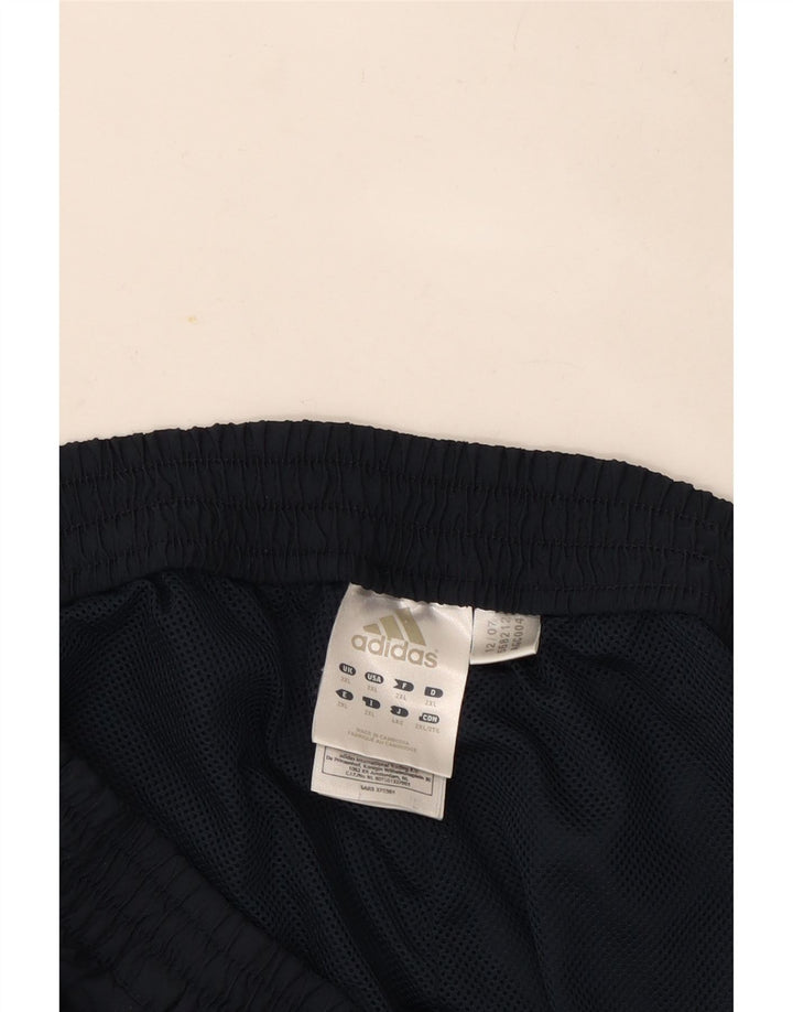 Męskie spodnie dresowe Adidas 2XL granatowe, poliestrowe