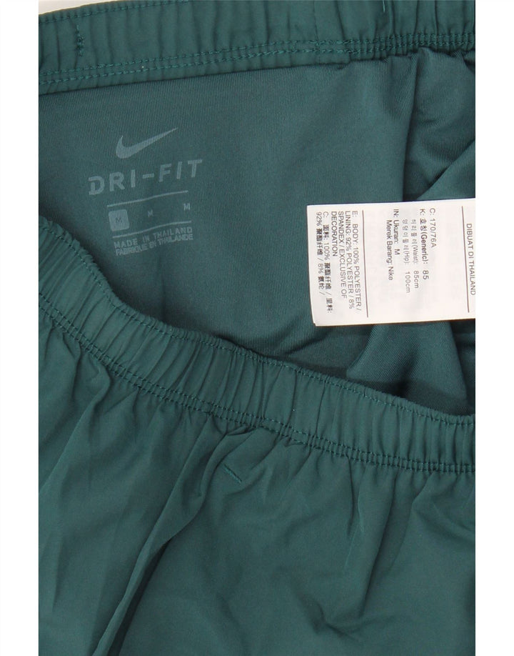 Męskie spodenki sportowe Nike Dri Fit Graphic, poliestrowe w kolorze średniej zieleni