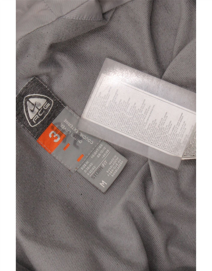 Damska kurtka wiatrówka NIKE Storm-Fit UK 14 w kolorze średniej czerwieni