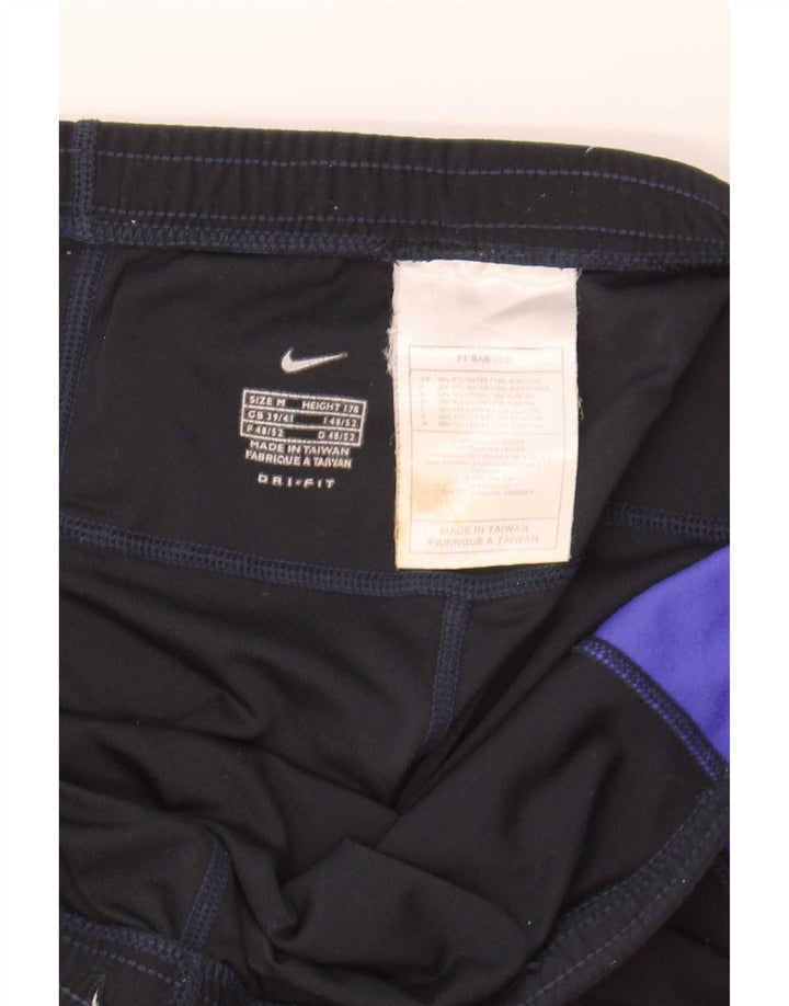 Męskie legginsy Nike Dri Fit UK 38/40, średni czarny poliester z blokami kolorów