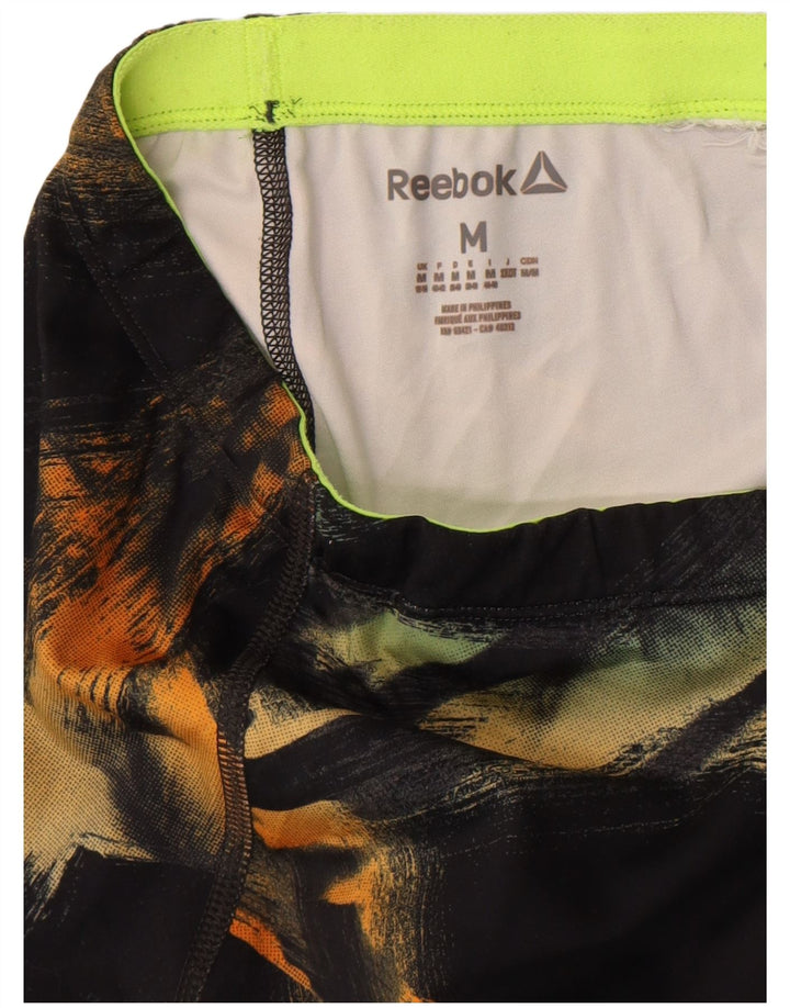 Damskie legginsy Reebok z abstrakcyjnym wzorem UK 12/14, średnie czarne