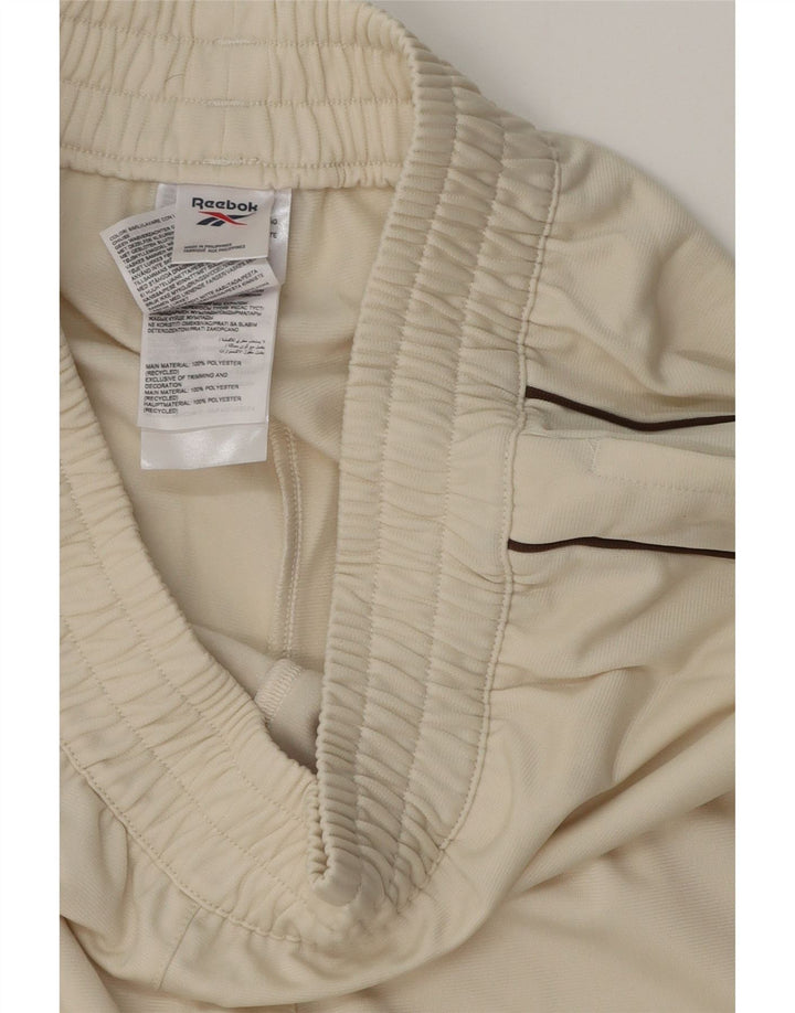 Damskie spodnie dresowe REEBOK UK 10 Small Beżowy Poliester