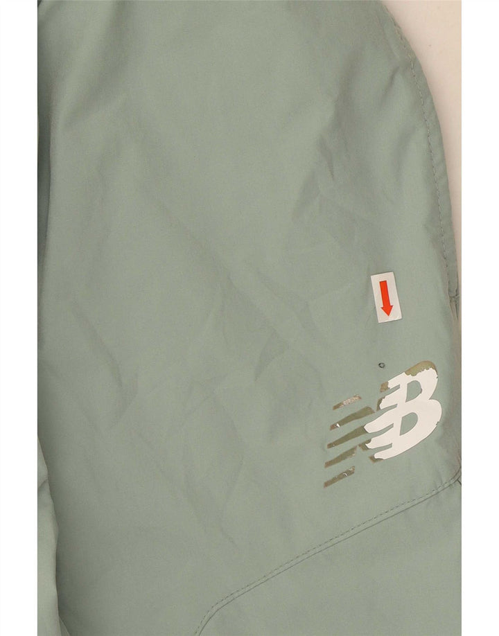 Męskie spodnie dresowe New Balance Cargo, średni zielony poliester