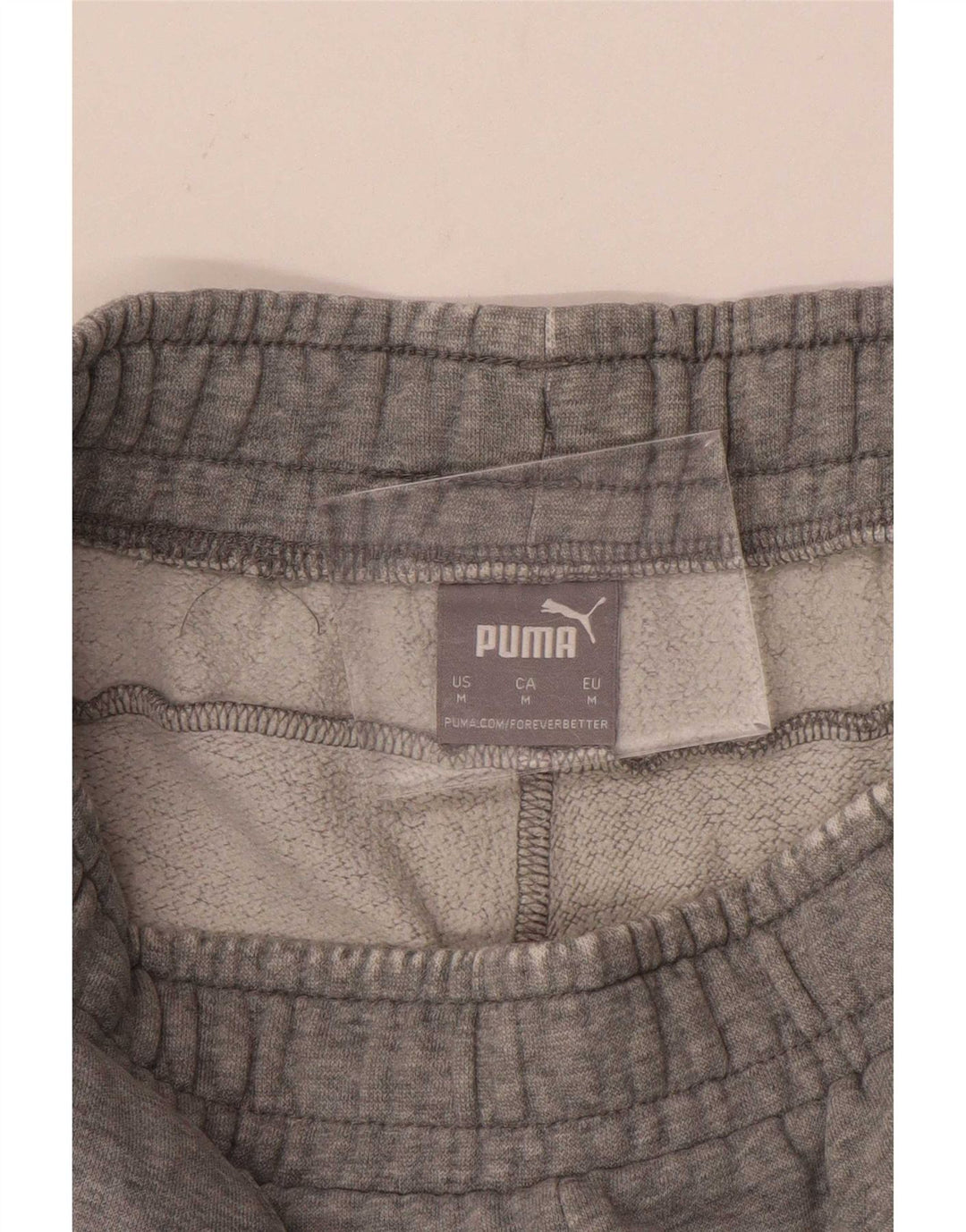 Męskie spodnie dresowe Puma Joggers średnioszare nakrapiane
