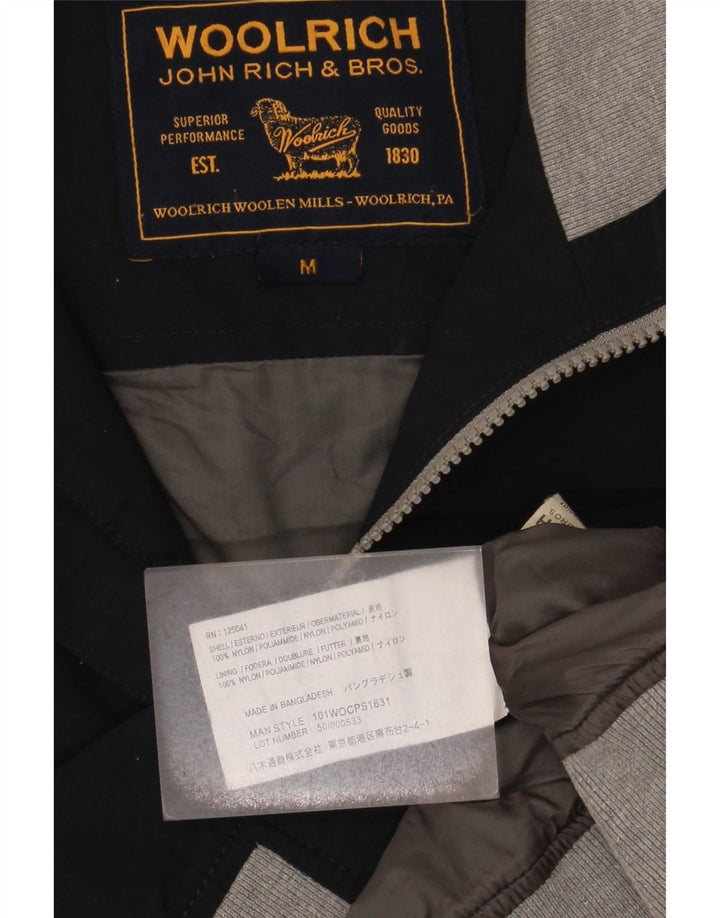 Męska kurtka bomber Woolrich UK 38 Średni granatowy nylon z blokami kolorów