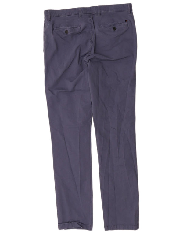 Męskie spodnie chino ze stretchem i wąskim krojem Tommy Hilfiger W34 L34 Niebieska bawełna