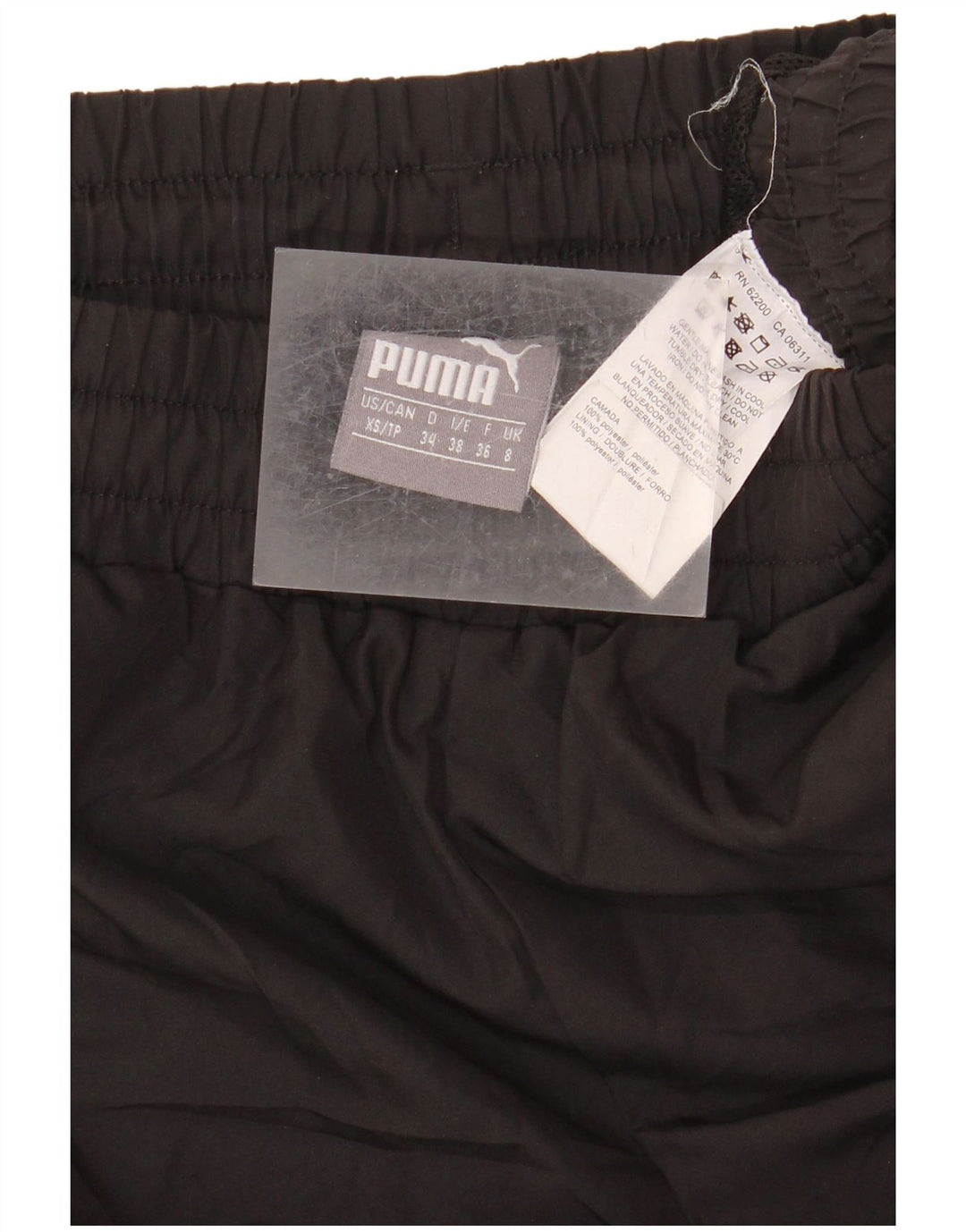 Damskie spodnie dresowe PUMA UK 8, małe, czarne, poliestrowe