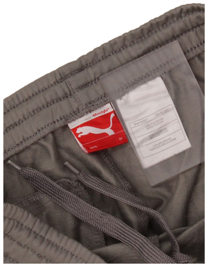 Chłopięce spodnie dresowe Puma z grafiką 9-10 lat, średnioszare, z blokami kolorów