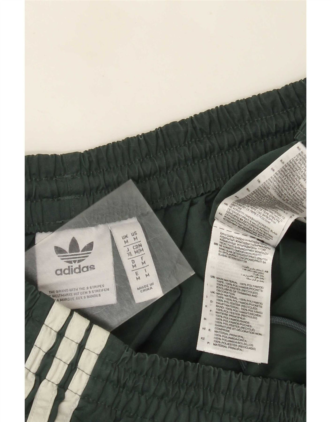 Męskie spodnie dresowe Adidas Cargo, średni zielony poliamid