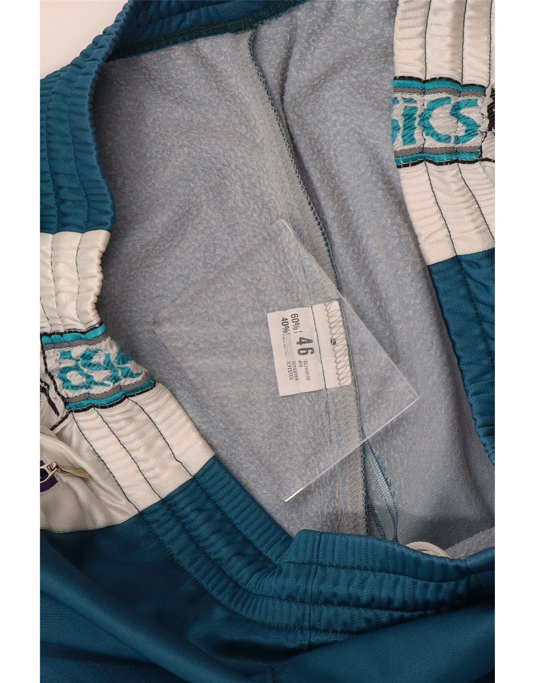 Męskie spodnie dresowe ASICS IT 46 Small Blue Colorblock