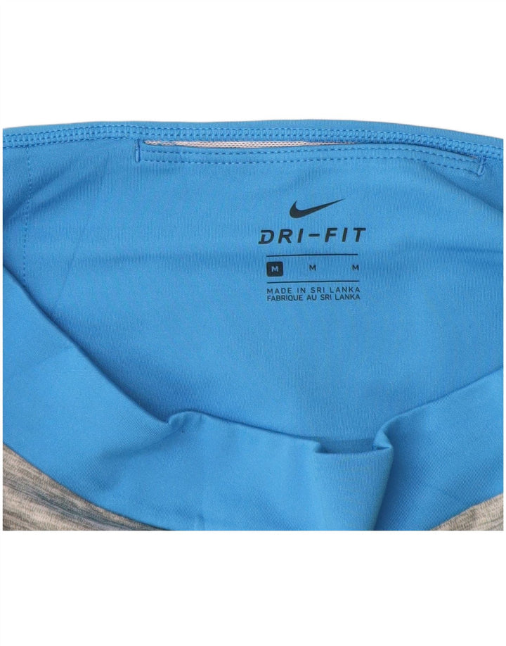 Damskie legginsy Nike Dri Fit UK 12, średnie, wielokolorowe bloki kolorów