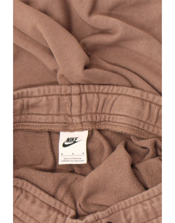 Męskie spodnie dresowe Nike, średnio brązowe