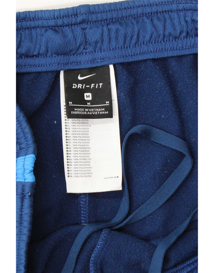 Męskie spodnie dresowe Nike Dri Fit, poliester w kolorze średnioniebieskim