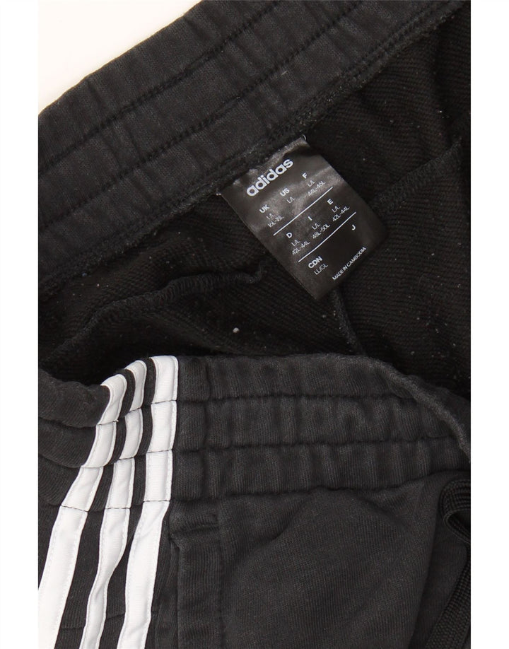 Damskie spodnie dresowe ADIDAS Joggers UK 16/18, duże czarne