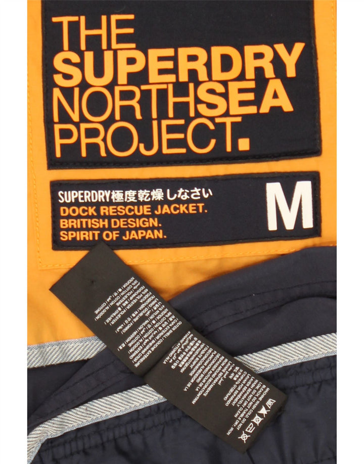 Męska kurtka wiatrówka z kapturem Superdry UK 38, średni granat, blok kolorów