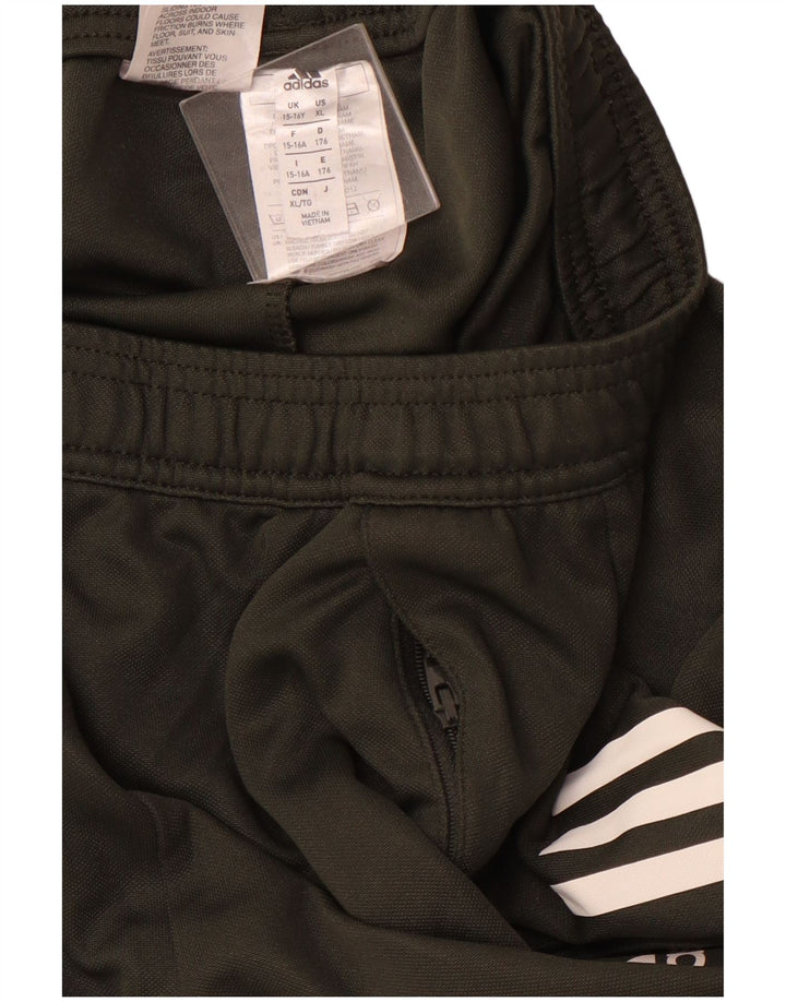 Chłopięce spodnie dresowe ADIDAS Manchester United 15-16 lat Zielone