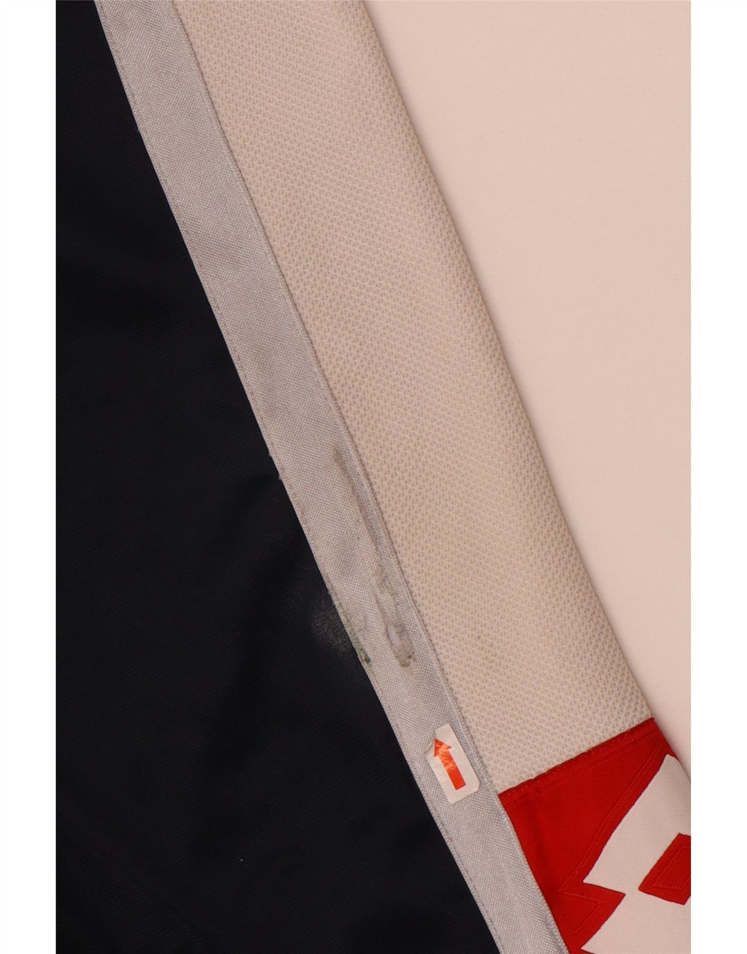 Męskie spodnie dresowe Lotto z grafiką, małe, granatowe, z blokami kolorów