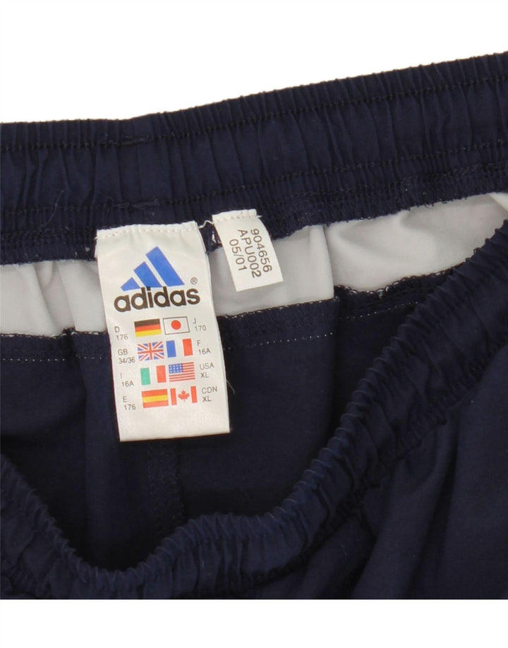 Chłopięce spodnie dresowe Adidas 15-16 lat Granatowy poliester z blokami kolorów