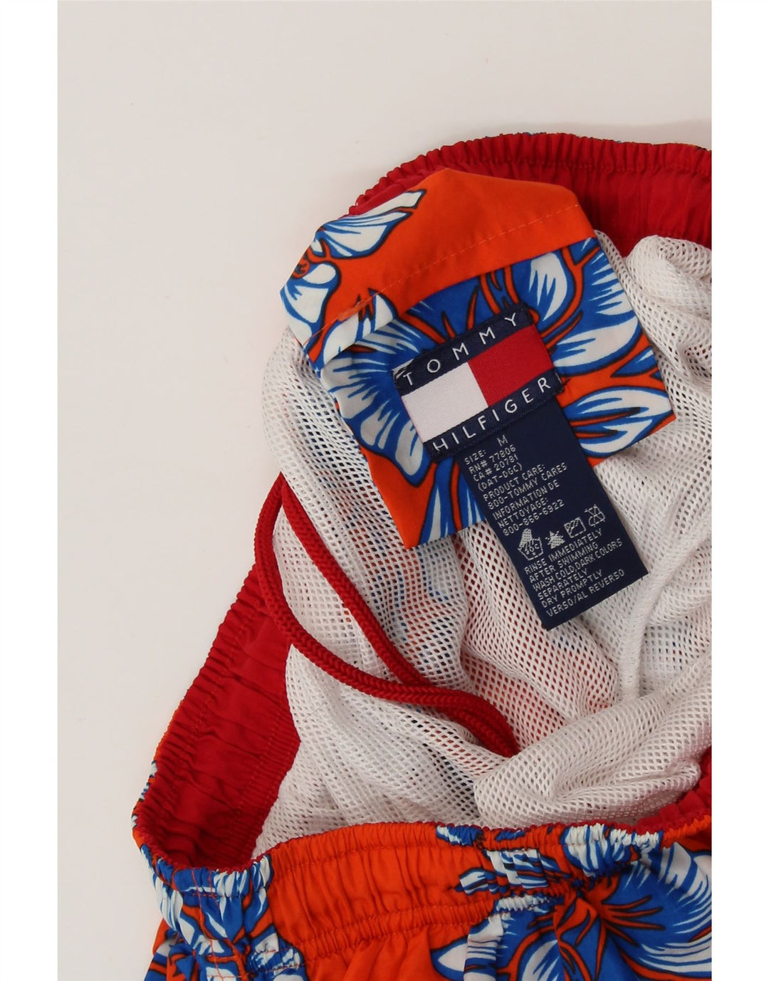 Męskie spodenki kąpielowe TOMMY HILFIGER w kolorze średniopomarańczowym w kwiaty