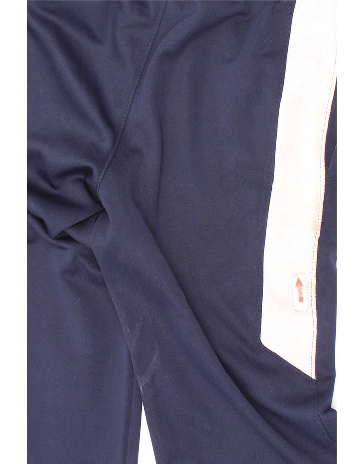 Chłopięce spodnie dresowe Nike w wieku 6-7 lat, duże, granatowe, z blokami kolorów