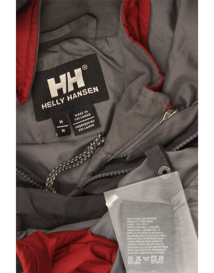 Męska kurtka wiatrówka z kapturem Helly Hansen UK 38 w kolorze średnioszarym