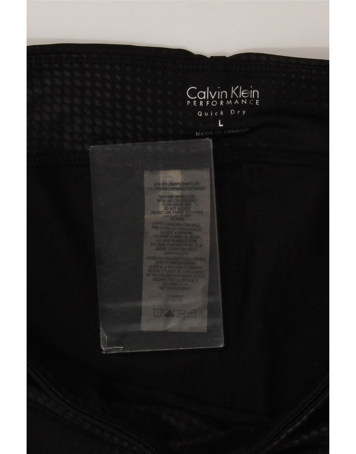 Damskie legginsy Calvin Klein Performance Capri UK 14, duże, czarne, geometryczne
