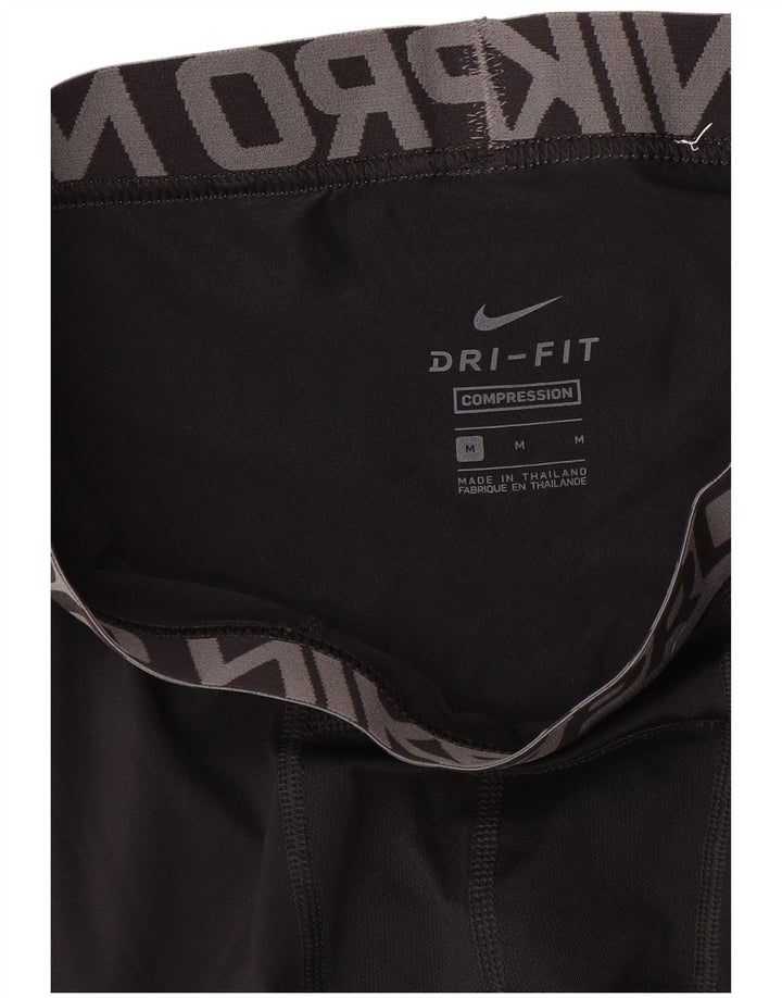Męskie legginsy Nike Compression Graphic Capri, średnie czarne