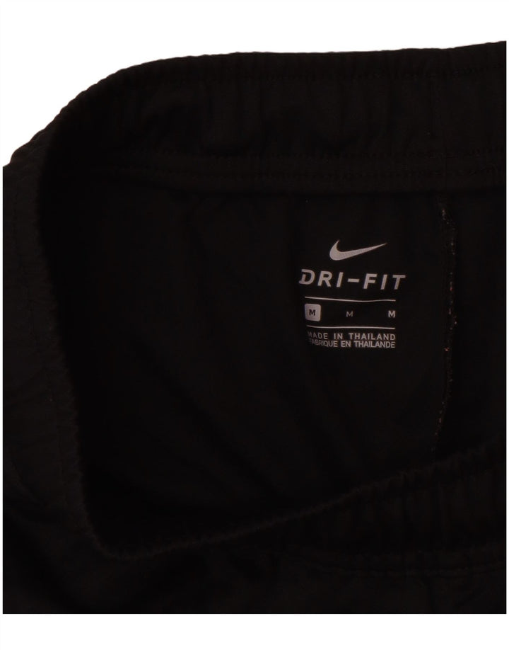 Damskie spodnie dresowe Nike Dri Fit Graphic UK 14, średni czarny poliester